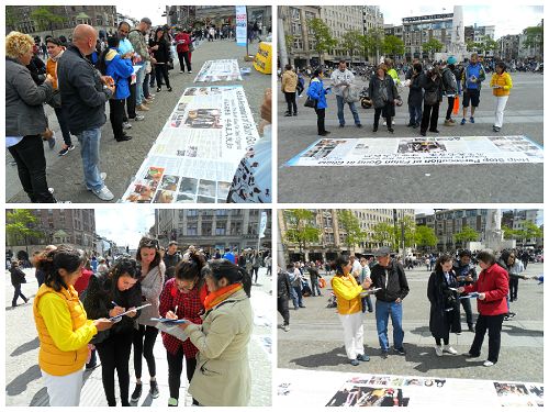 来自各国的游客驻足法轮功真相展板前，观看真相展板上的图片并签名支持法轮功反迫害