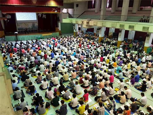 '图：法轮功学员在台中举办了一年一度的“向大陆讲真相学法交流会”。'